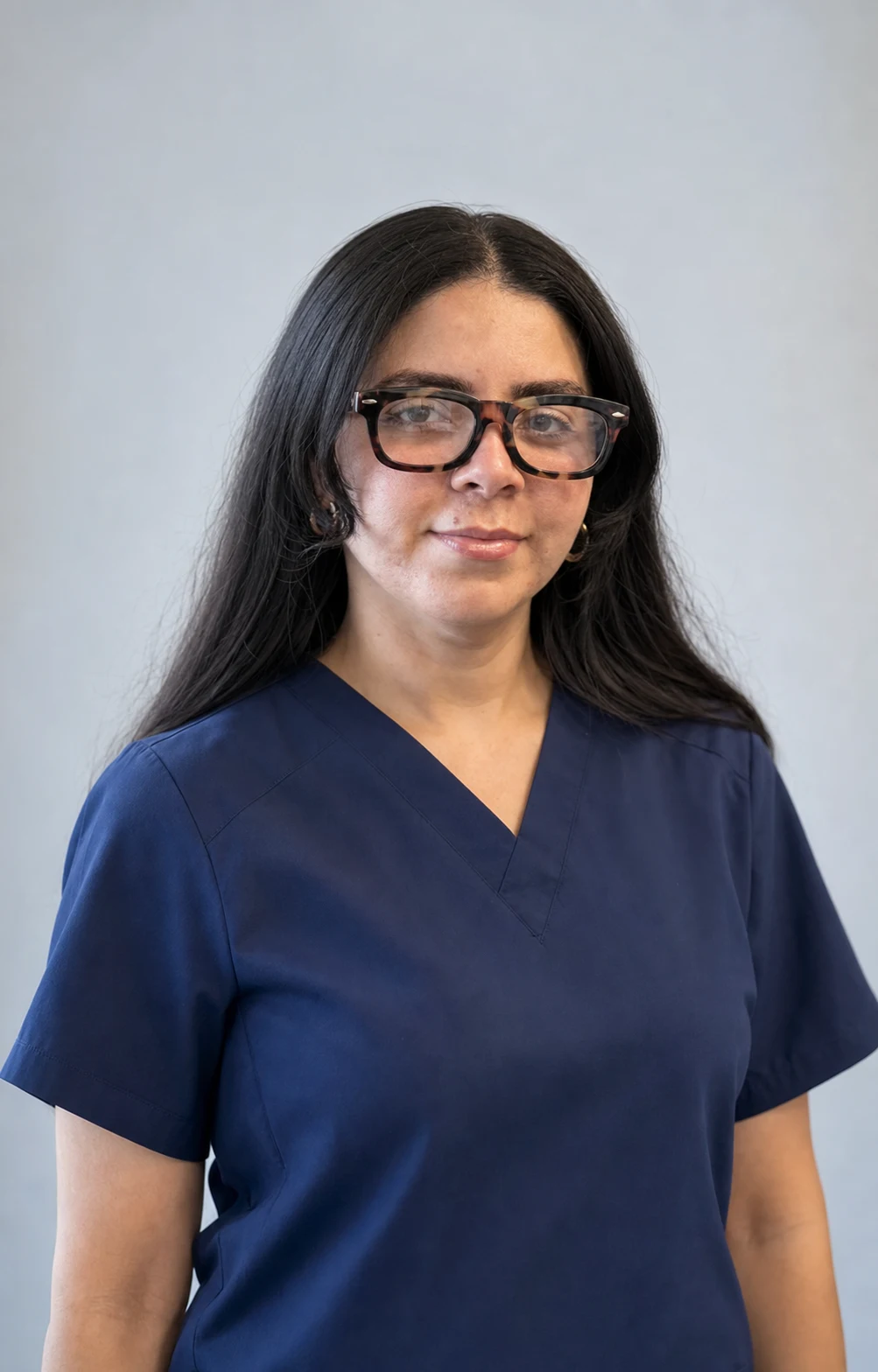 Temporary AI-assisted portrait of Saily Martinez, a Miami clinic team member, derived from authorized group photographs.